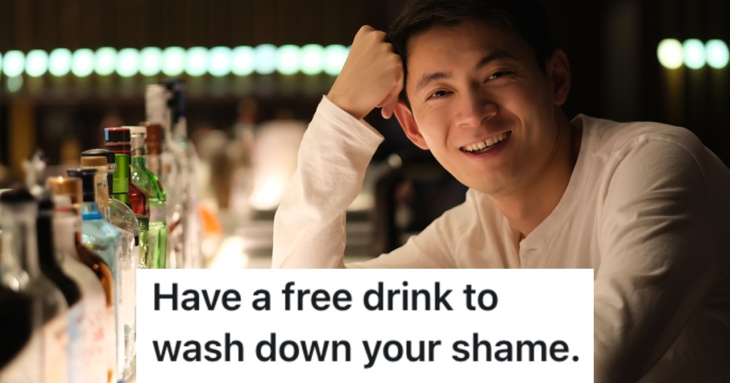 man sitting at a bar