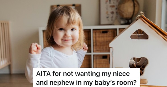little girl playing with doll house in kid's room