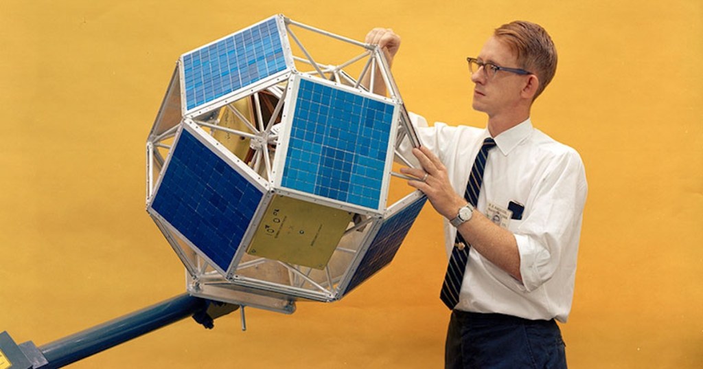 An early LES satellite being inspected