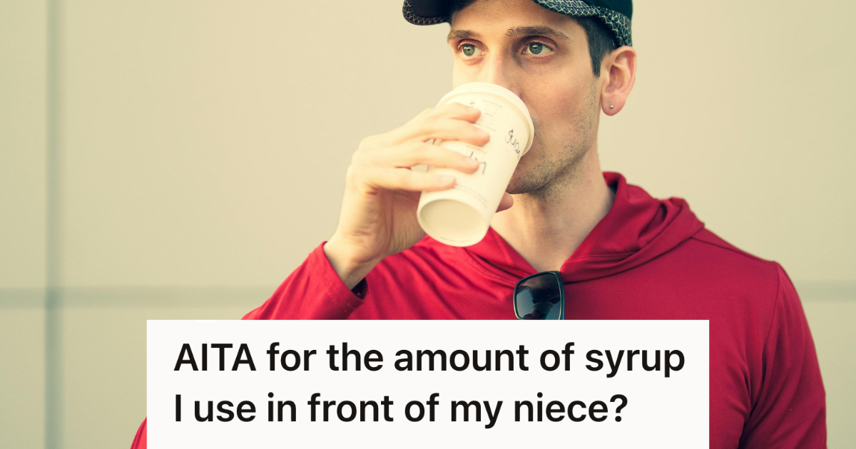 man drinking a latte