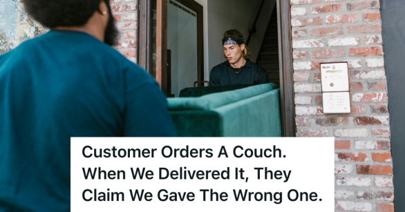 men moving a couch into a building