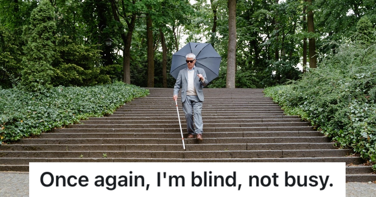  blind person using a cane to navigate steps