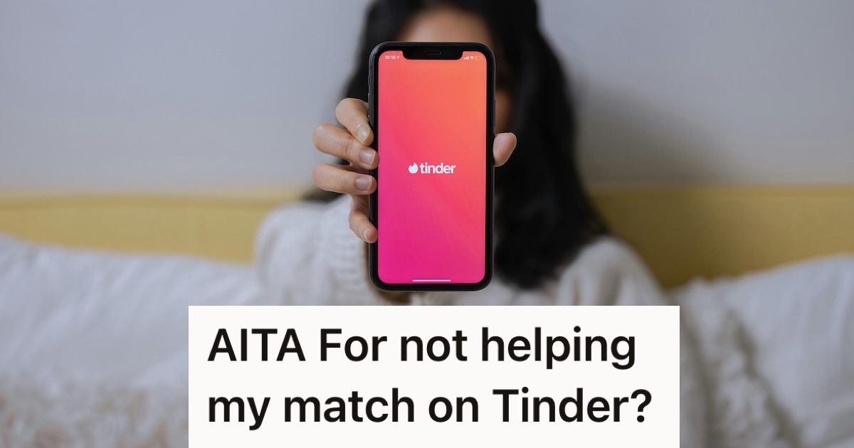 Woman holding up a phone with a dating app