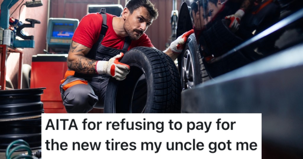 man putting tire on a car