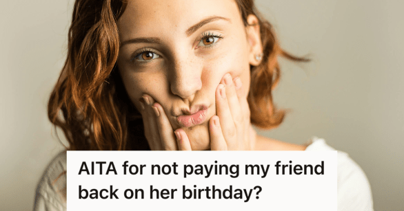 woman holding her face