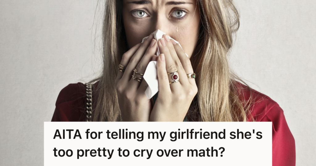 young woman wiping her tears with a tissue