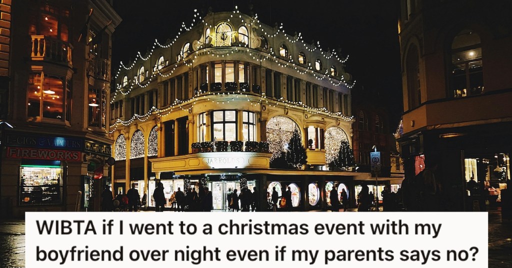 A city decorated for Christmas at night