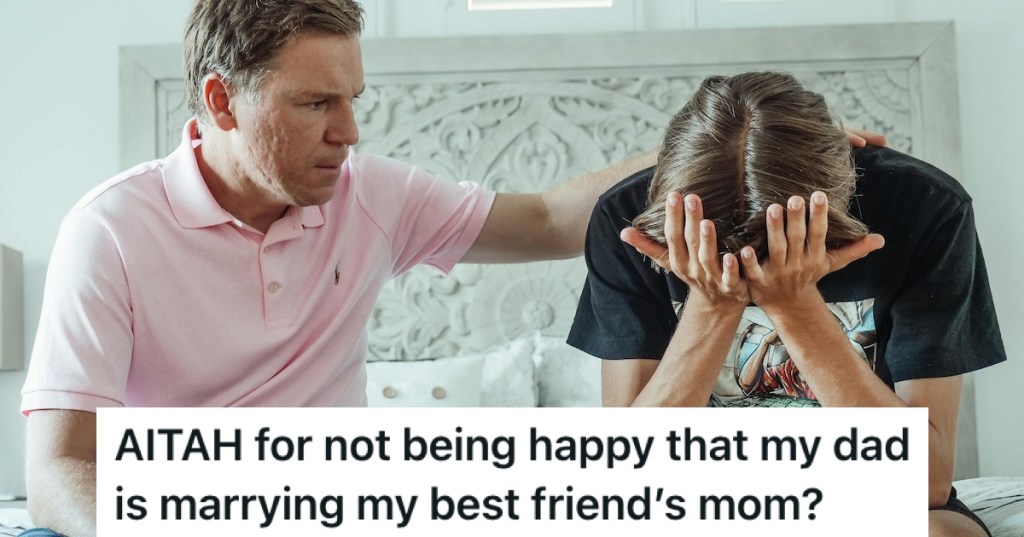 A man comforting a crying teenage boy