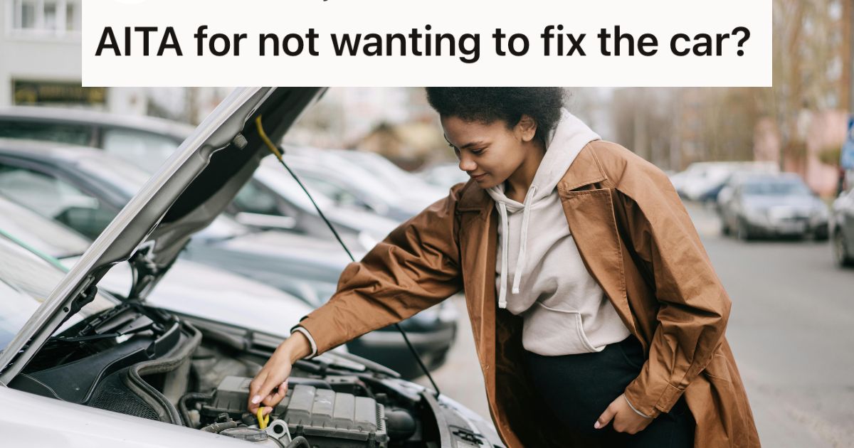 Woman fixing a car