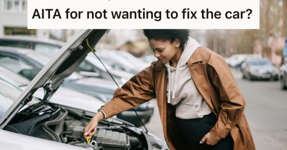 Woman fixing a car