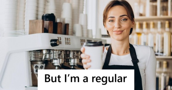 Woman barista holding coffee cup