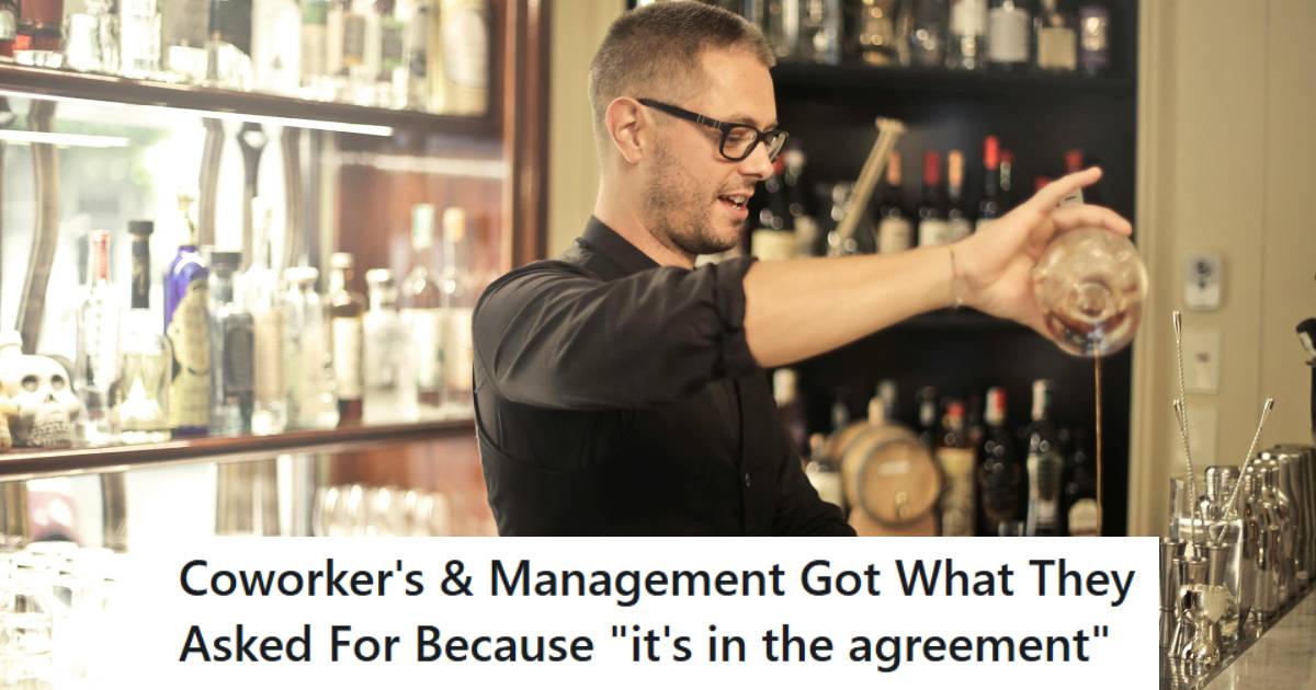 Male bartender smiling as he pours drinks because he's protected by his union