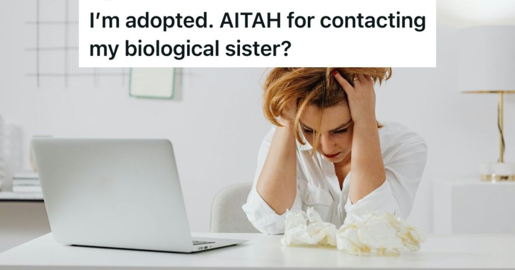 Sad woman sitting in front of a laptop