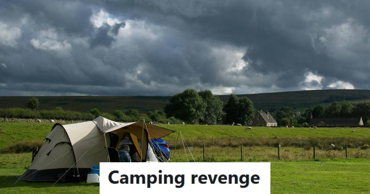 People in a tent in the middle of a field with storm clouds looming overhead