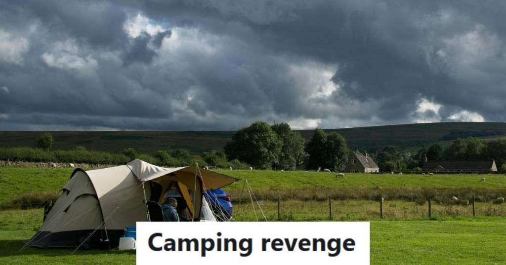 People in a tent in the middle of a field with storm clouds looming overhead