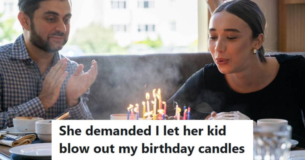 Woman at a restaurant with her friends, blowing the candles out on her bday cake