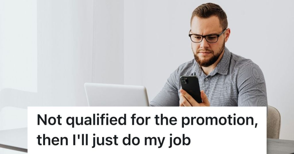 Man staring intently at his smartphone screen.