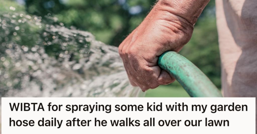 Man spraying a water hose