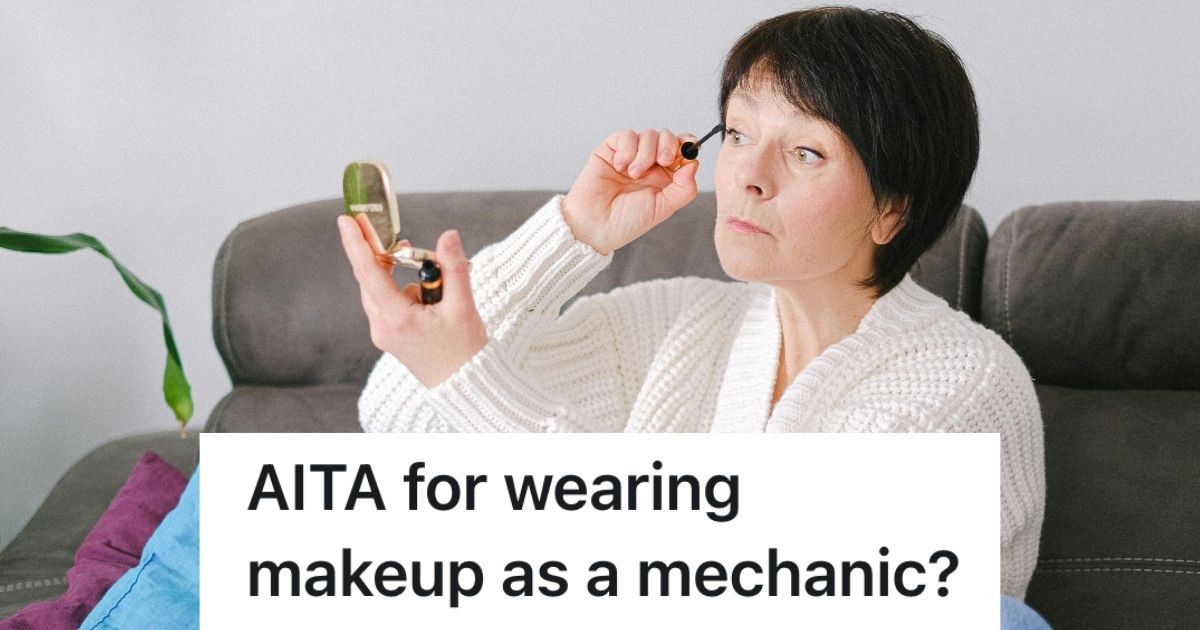 Woman applying mascara on herself