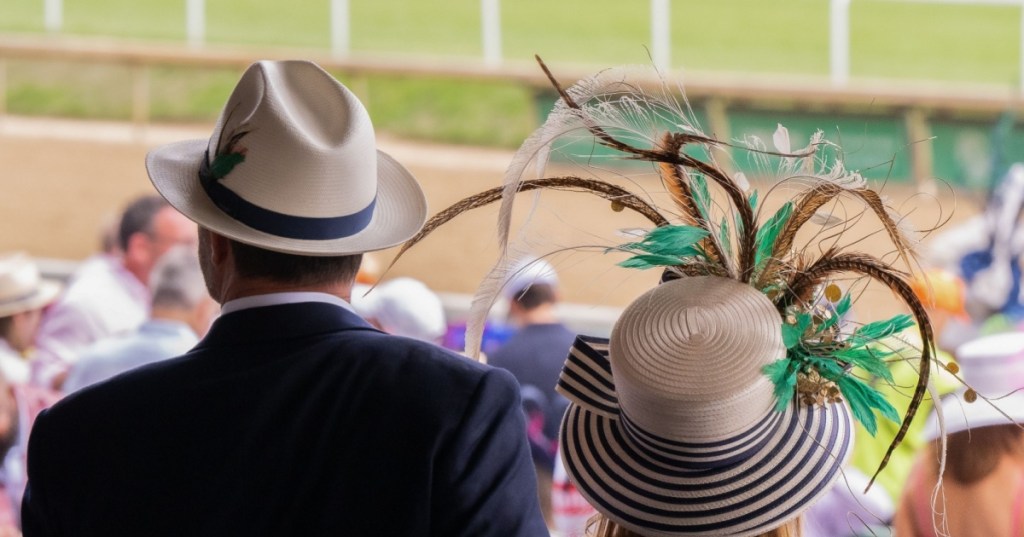 Couple with feathers in their hats