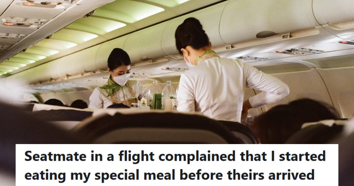 Flight attendants working their way through the plane, serving food and drinks