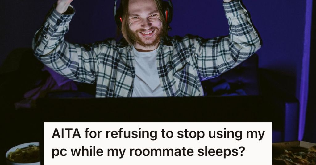 Man happily gaming in the dark