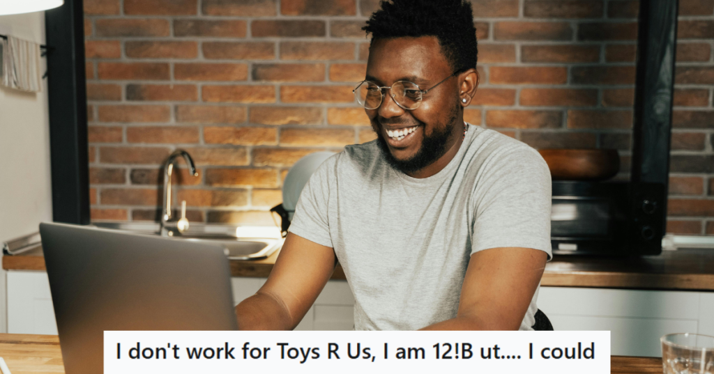 Man in grey shirt working on his laptop