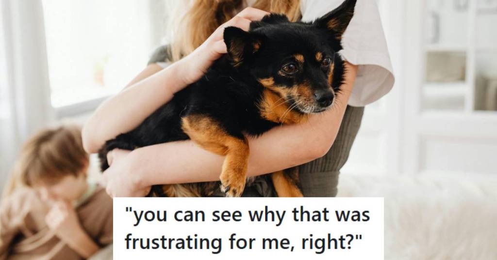 Woman holding her small brown and black dog in her arms