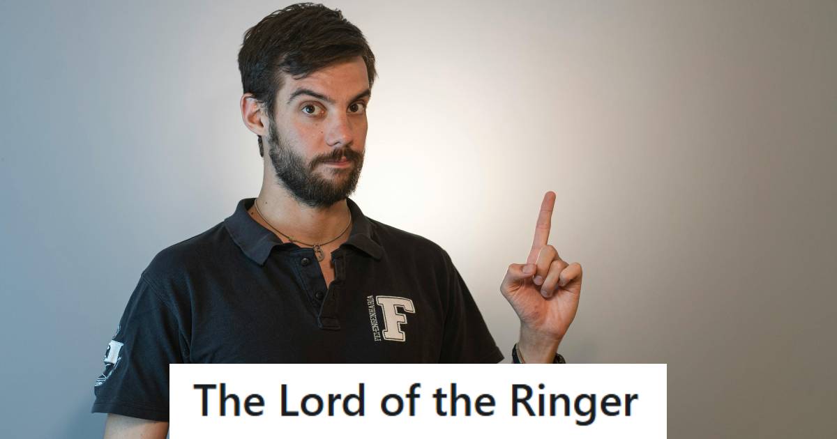 Man standing with his finger in the air because he has a good idea