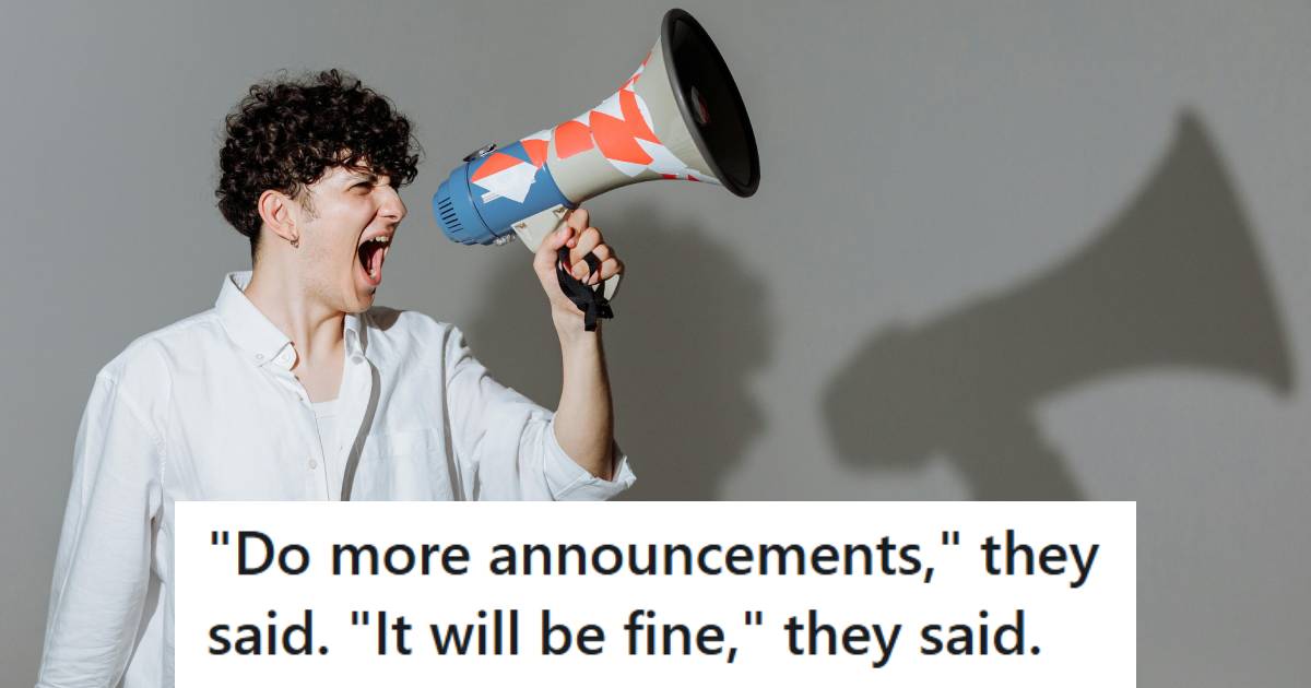 Man yelling into a loud speaker, giving announcements in a grocery store