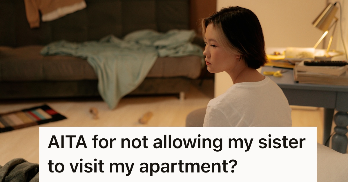 Woman sitting in a messy room