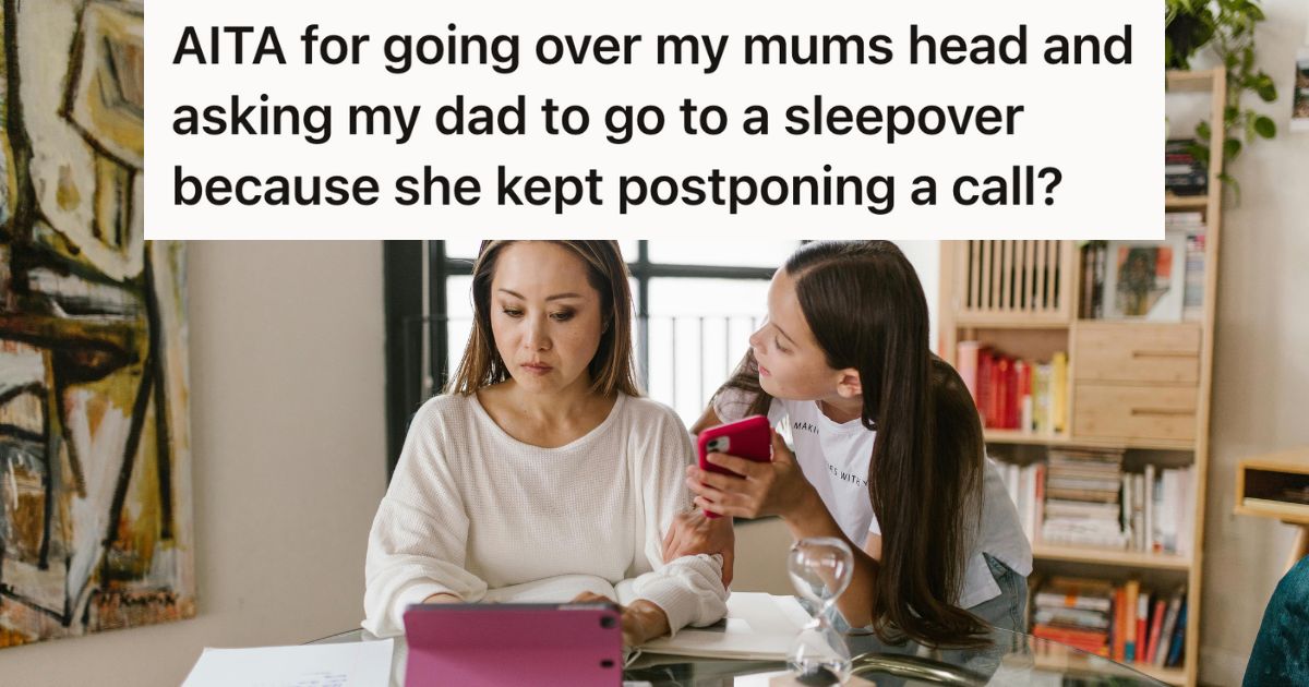 Teen girl showing a phone to upset mom