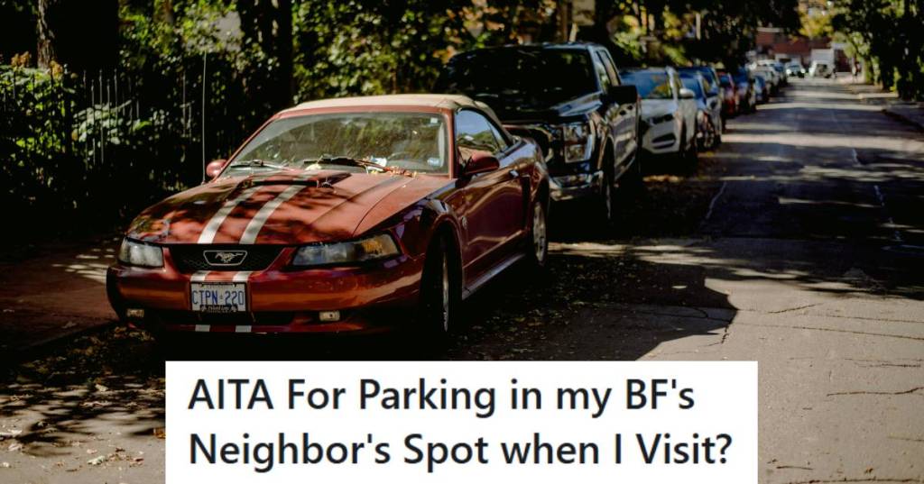Red, convertible mustang parked on street in front of a home