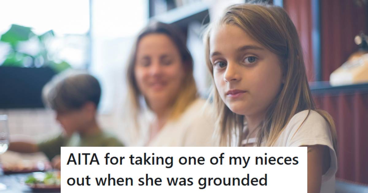 Young girl upset because she has to eat a restaurant that she doesn't like