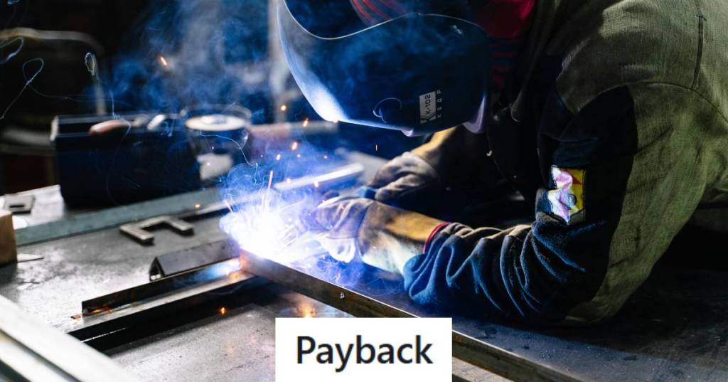 Man welding a piece of steel for an American defense contractor