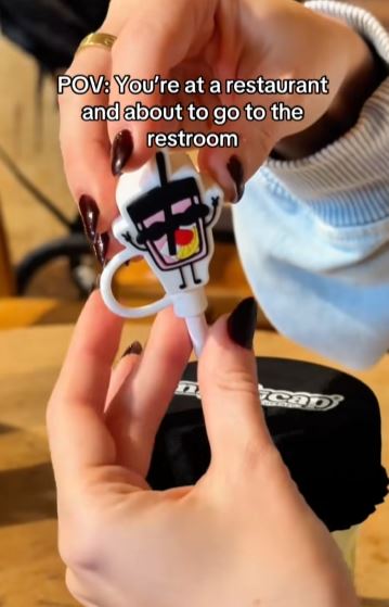 Woman protecting her drink