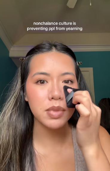 Woman talking and doing makeup