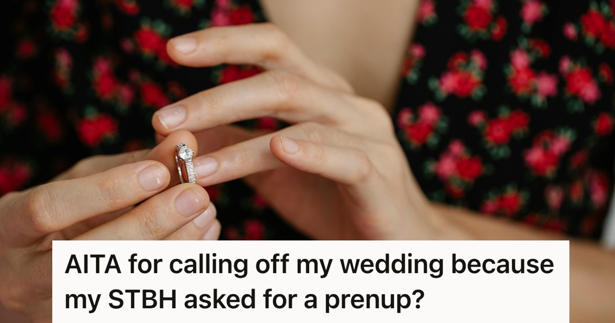 Woman taking off an engagement ring