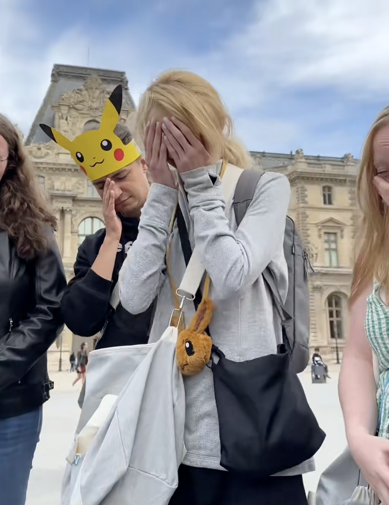 people outside the louvre museum