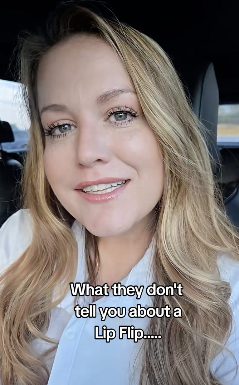 woman sitting in her car