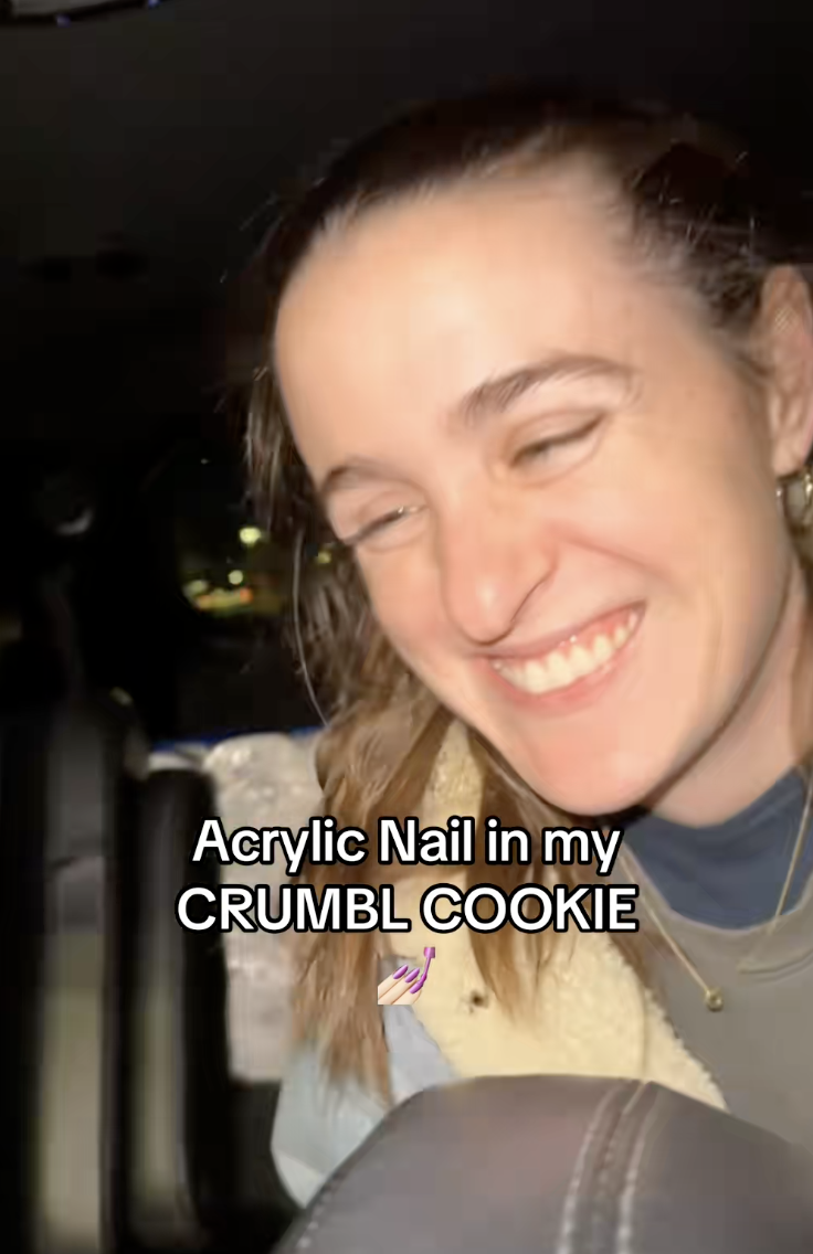 woman laughing in a car