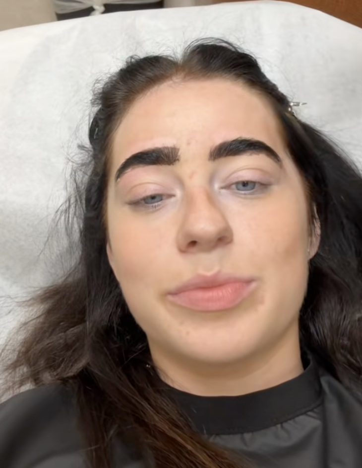 woman getting her brows waxed