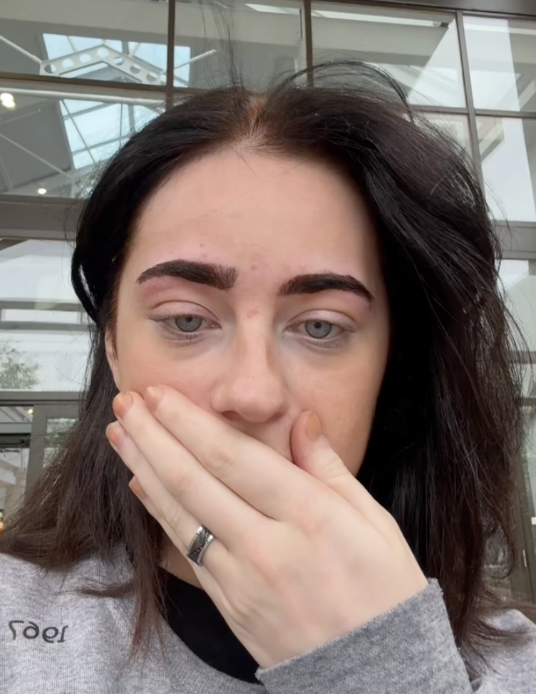 woman with a shocked expression