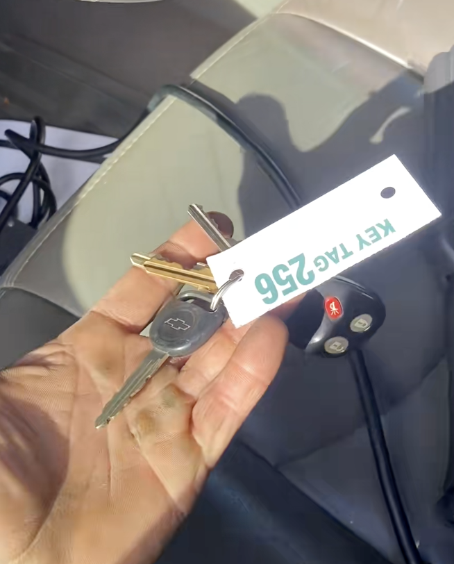 man holding car keys