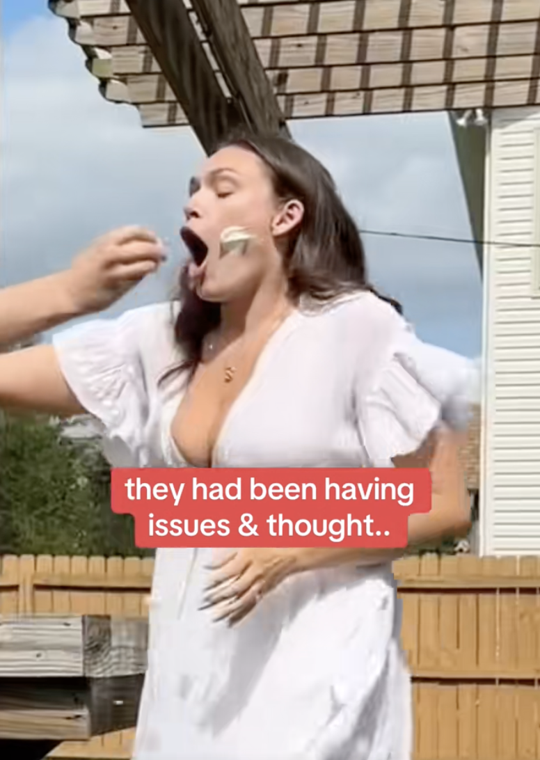 woman with cake on her face