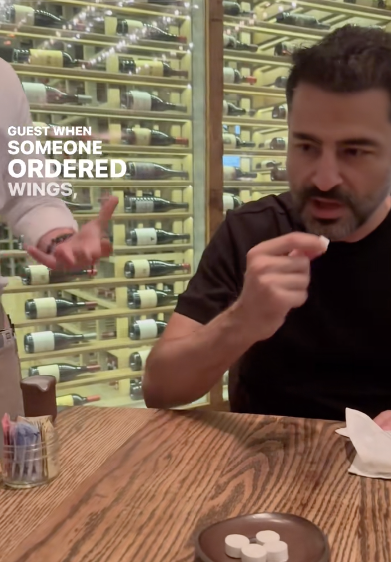 man eating at a restaurant