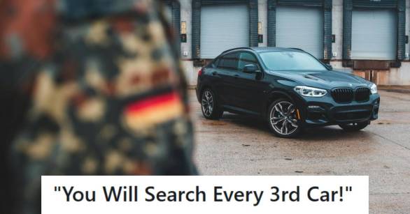 Military officer's car parked outside, waiting to be searched by MPs.