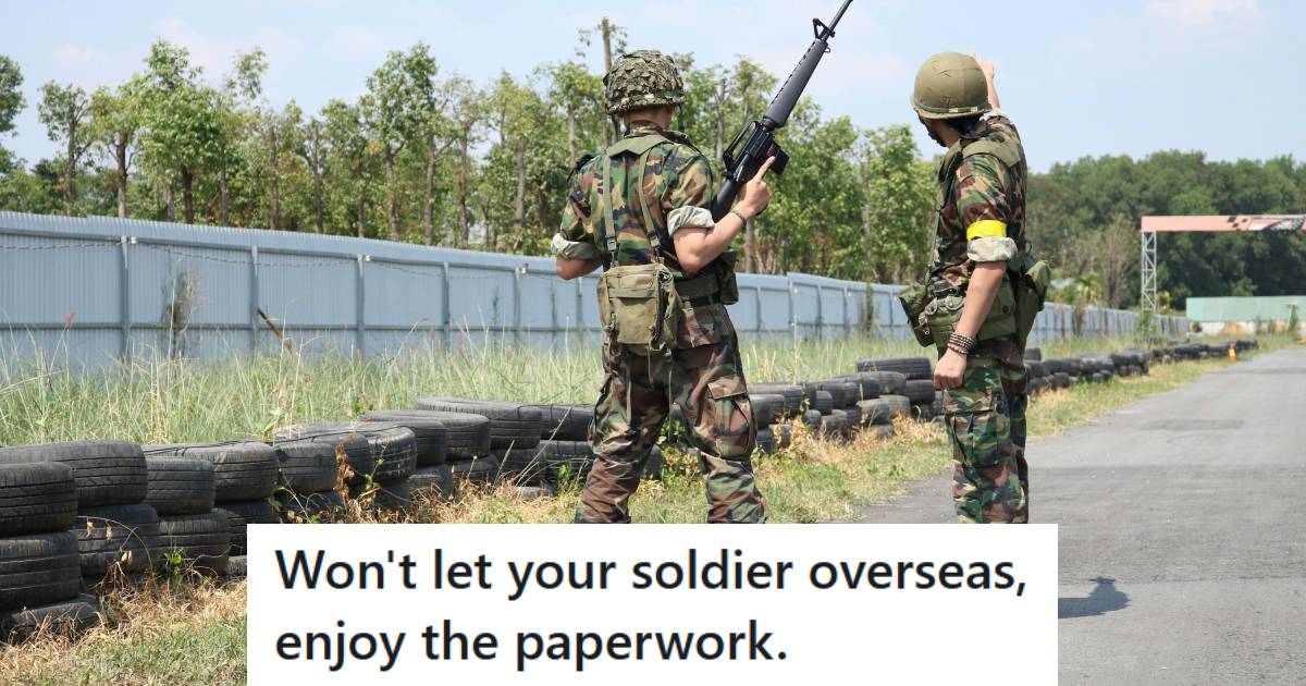 Soldiers standing outside waiting for the sergeant to approve their overseas paperwork