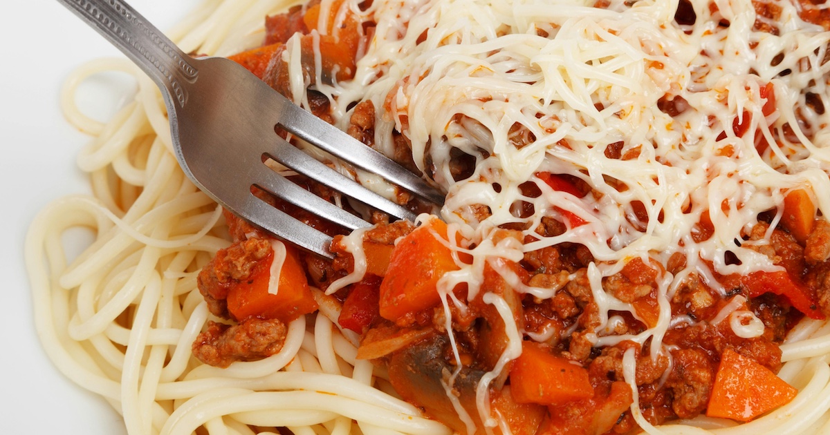 A fork in spaghetti bolognese