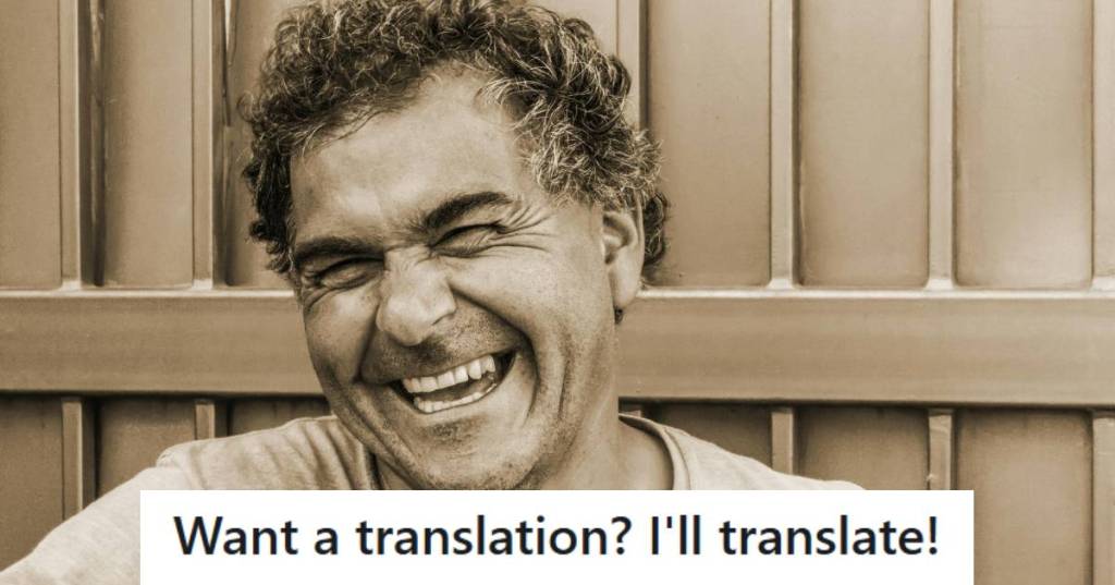 Man laughing and thinking about the time he translated a document